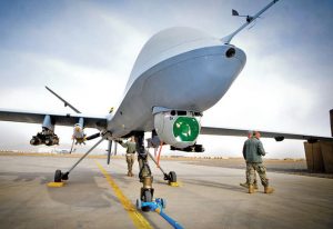 STRICTLY UNDER EMBARGO UNTIL 0001HRS, WEDNESDAY 18 DECEMBER 2013

Library Image (Feb 2011):
A ReaperUnmanned Aerial Systems (UAS) , part of 39 Squadron Royal Air Force. The Reaper has completed 20,000 operational flight hours in theatre, and is operated from Kandahar Air Field (KAF) in Afghanistan.

DEFENCE SECRETARY MEETS THE MILITARY’S REMOTE-CONTROL PILOTS

The MOD has, for the first time, opened the doors to its Unmanned Aerial Systems (UAS) control centre, based in the UK.

Pictures and footage released today show the hi-tech operations room at RAF Waddington in Lincolnshire where members of XIII Squadron remotely operate the RAF’s Reaper aircraft in Afghanistan. 

Reaper is just one of a range of UAS, including remotely piloted aircraft systems (RPAS), operated by all three Services providing vital, life saving intelligence, reconnaissance and surveillance on operations. 

Showing this work is a key way to dispel some common myths about the role of the equipment, which UK forces use predominantly in Afghanistan.